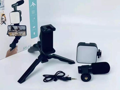 AY-49 Vlogging Kit – 5-in-1 Professional Video Making Setup with LED Light, Shotgun Mic, Tripod Stand, and Phone Holder